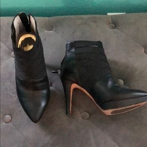 Cute black leather heeled booties